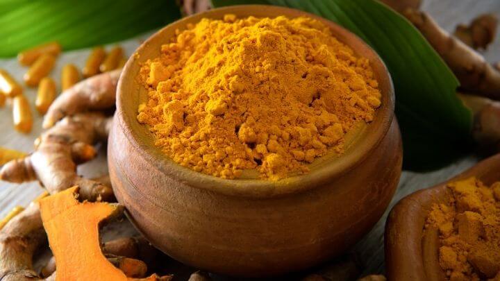 Ground turmeric in a bowl